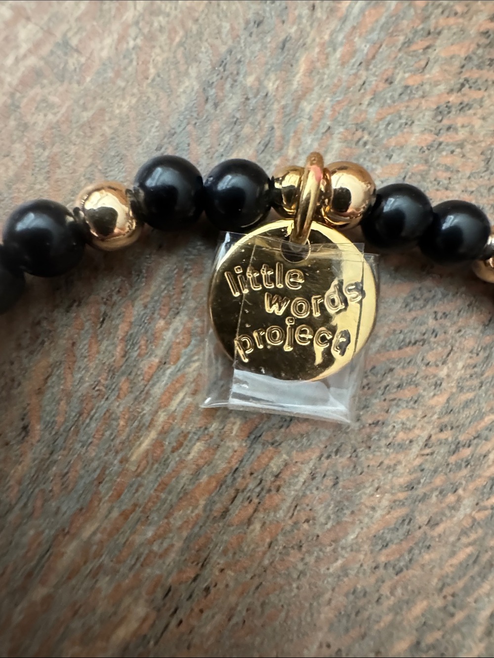 Little word project Worth It Black and Gold Beaded Stretch Bracelet S/M - Picture 2 of 3